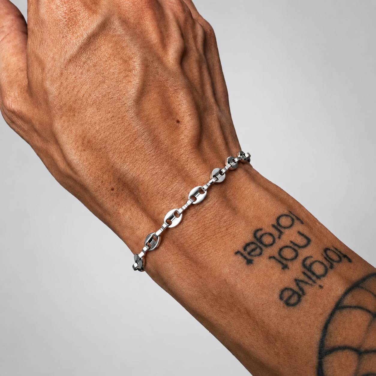 Coffee Bean Bracelet - Silver (5mm) worn on a wrist, showcasing its stylish design by JVillion®Streetwear Jewelry.