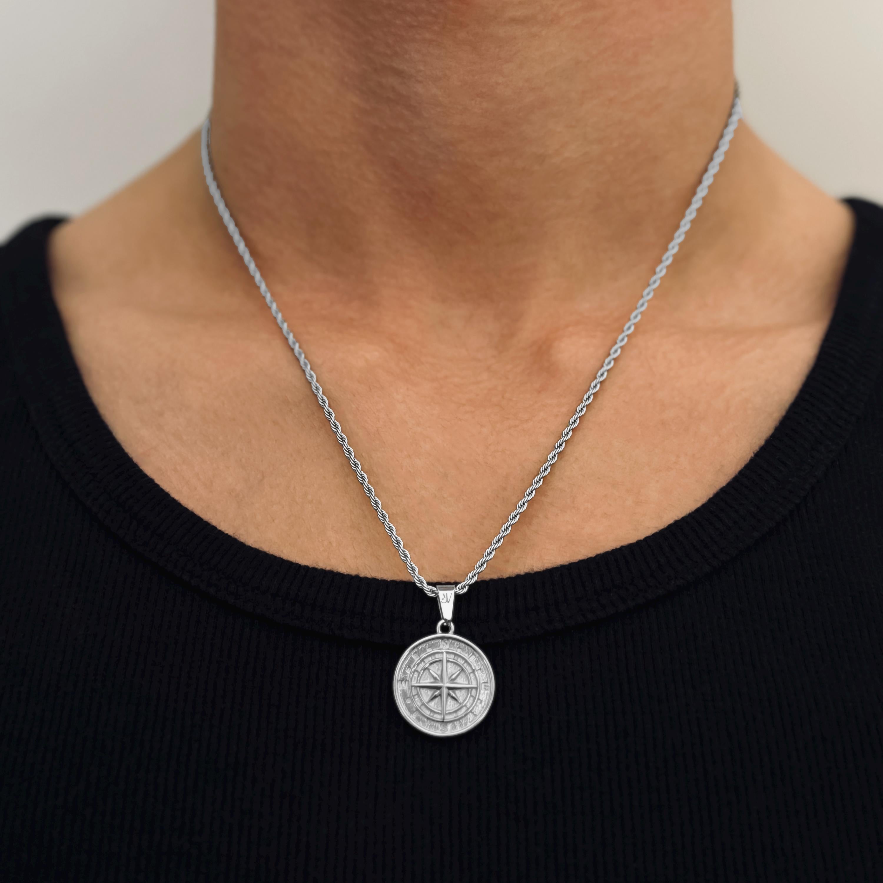 Silver compass north star pendant on 2mm rope chain worn by model, JVillion