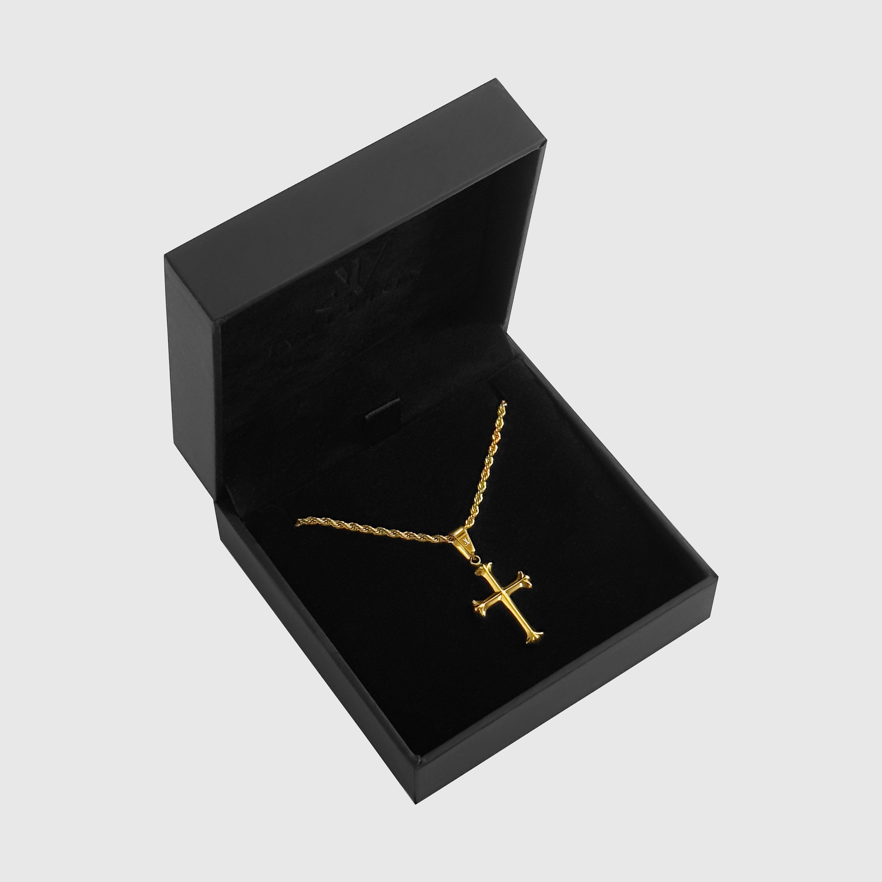 Gold cross pendant on 2mm rope chain in a black branded gift box, JVillion