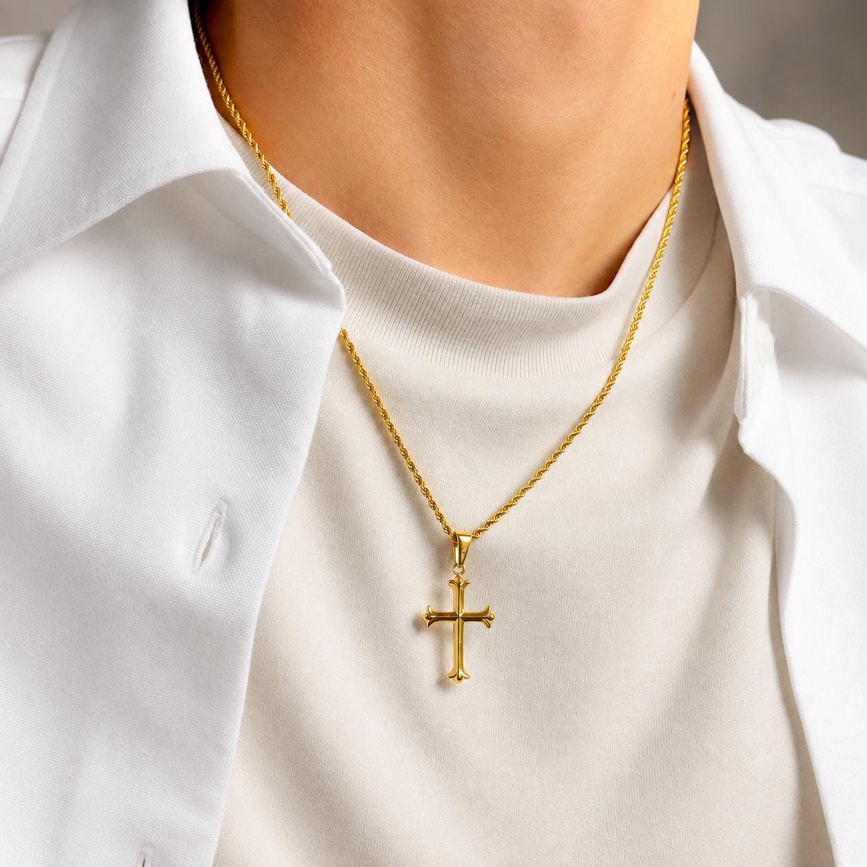 Gold cross pendant on 2mm rope chain worn by model, JVillion