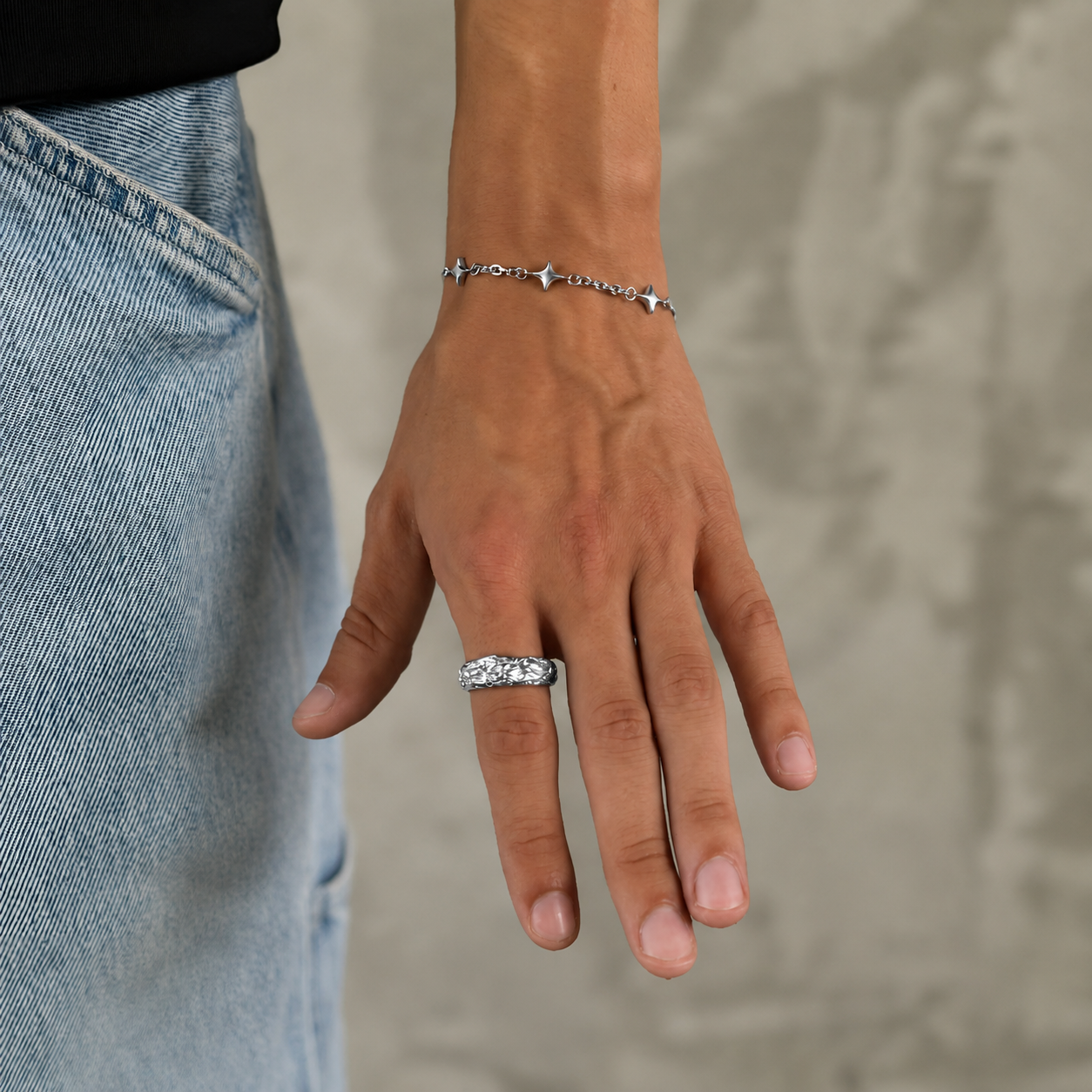 Man wearing chunky silver molten textured band ring, JVillion Blaze