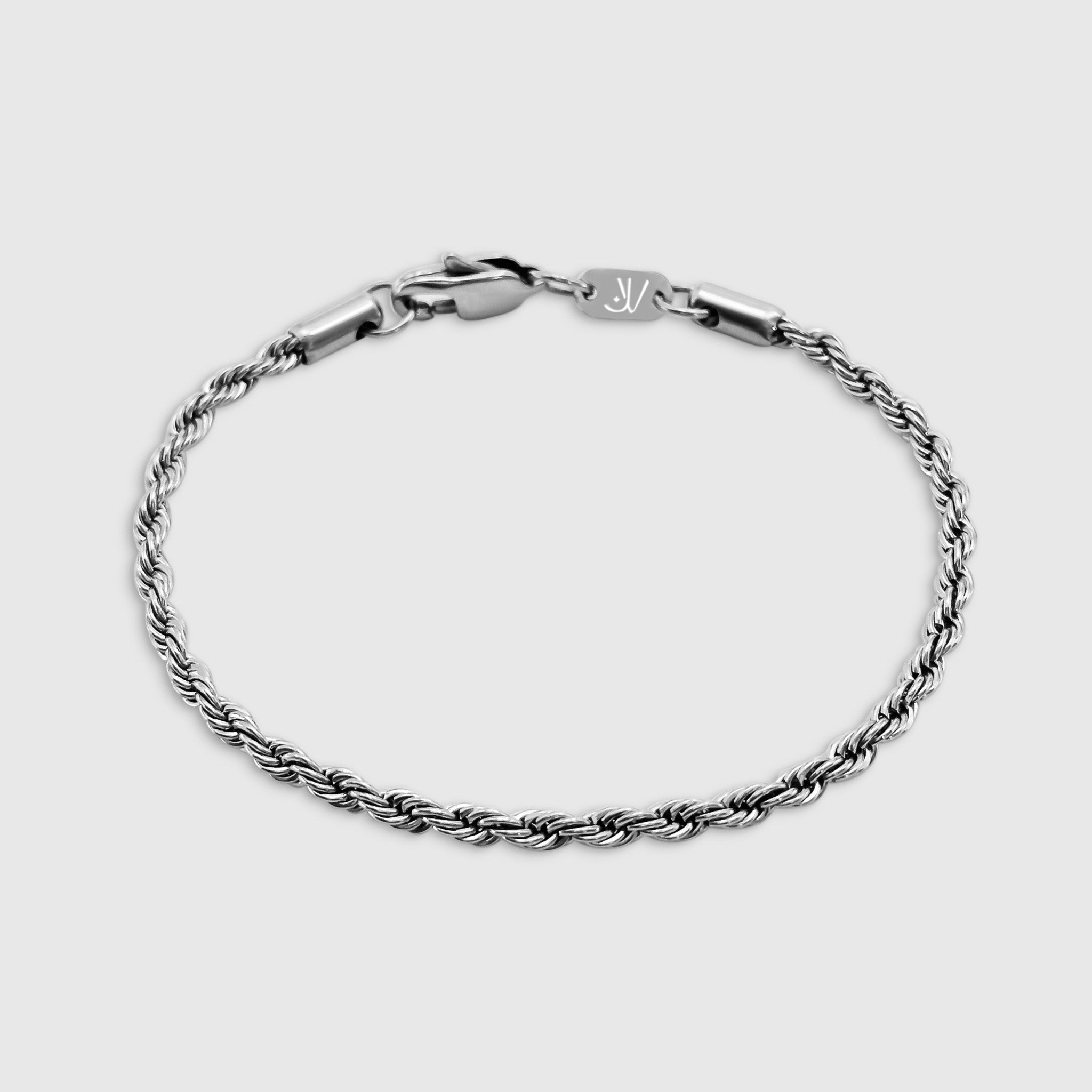 Men's silver rope bracelet, 3mm, stainless steel, on light background, JVillion