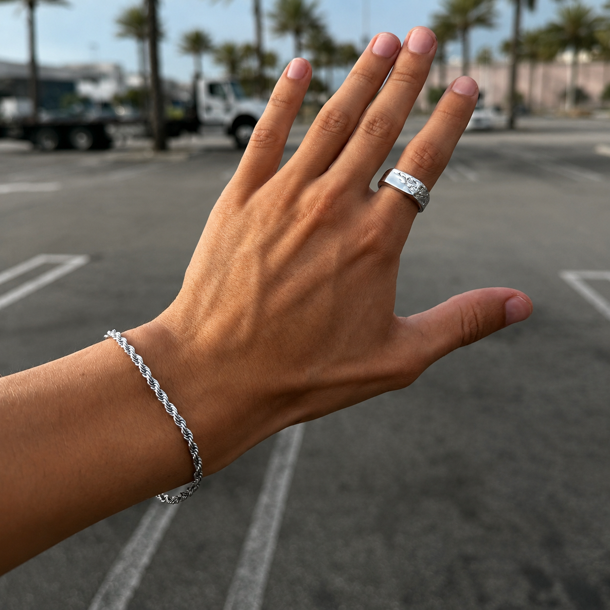Silver 3mm rope bracelet worn on the wrist outdoors, stainless steel, JVillion