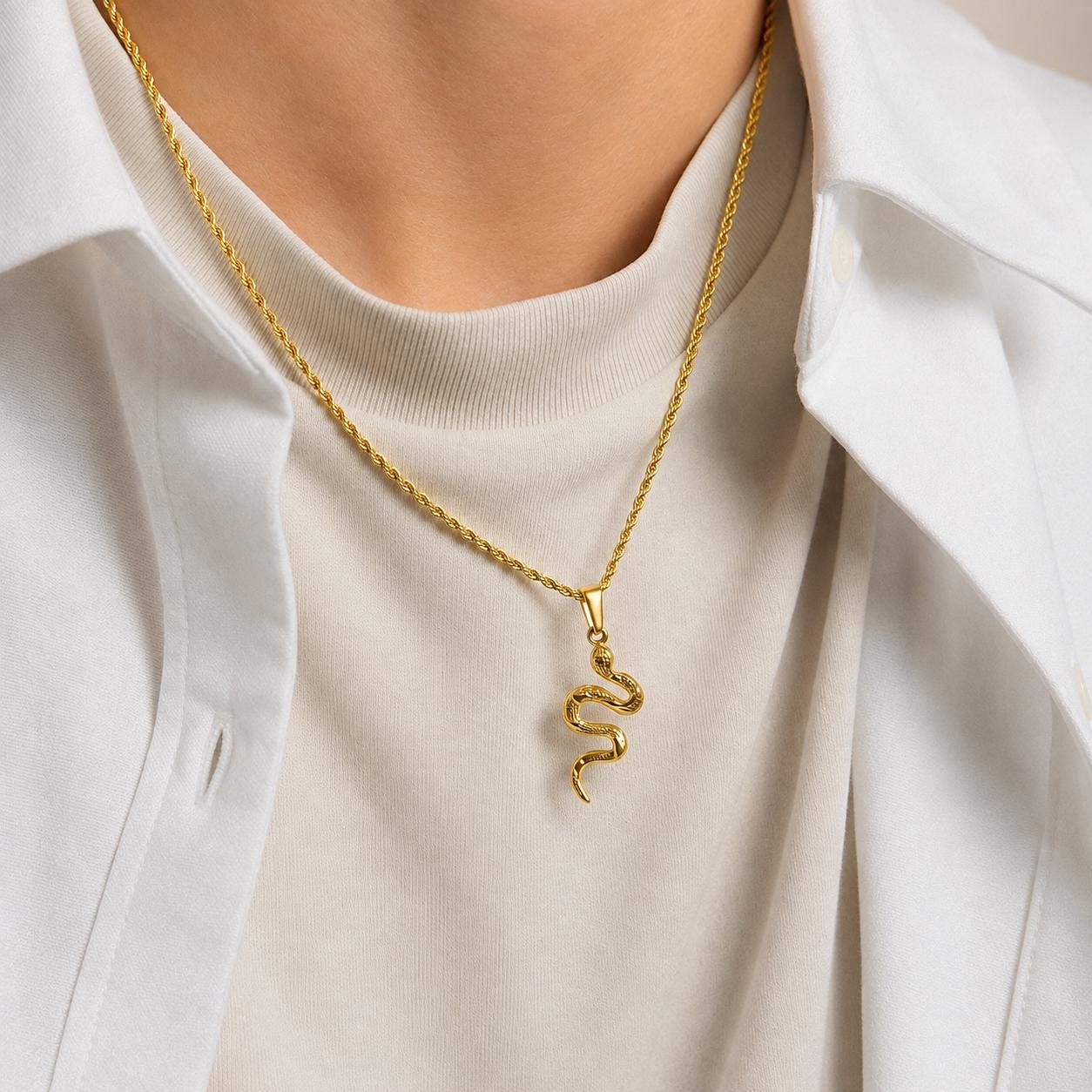 Gold viper snake pendant on 2mm rope chain worn by model, JVillion