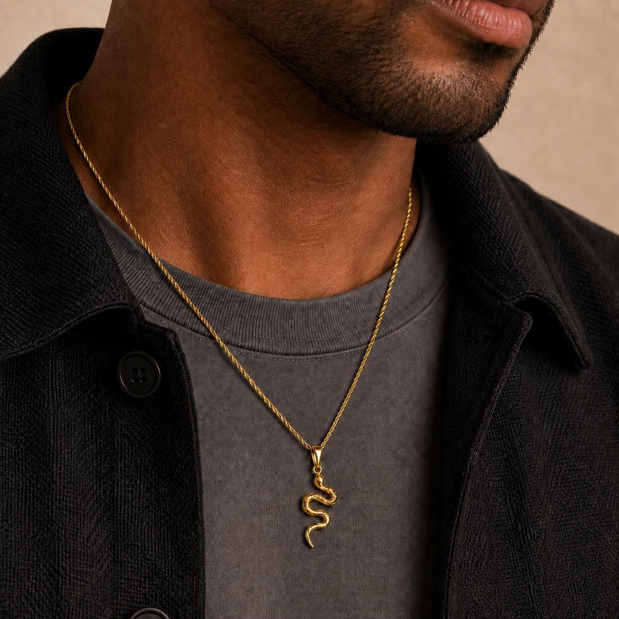 Gold viper snake pendant on 2mm rope chain worn by model, JVillion