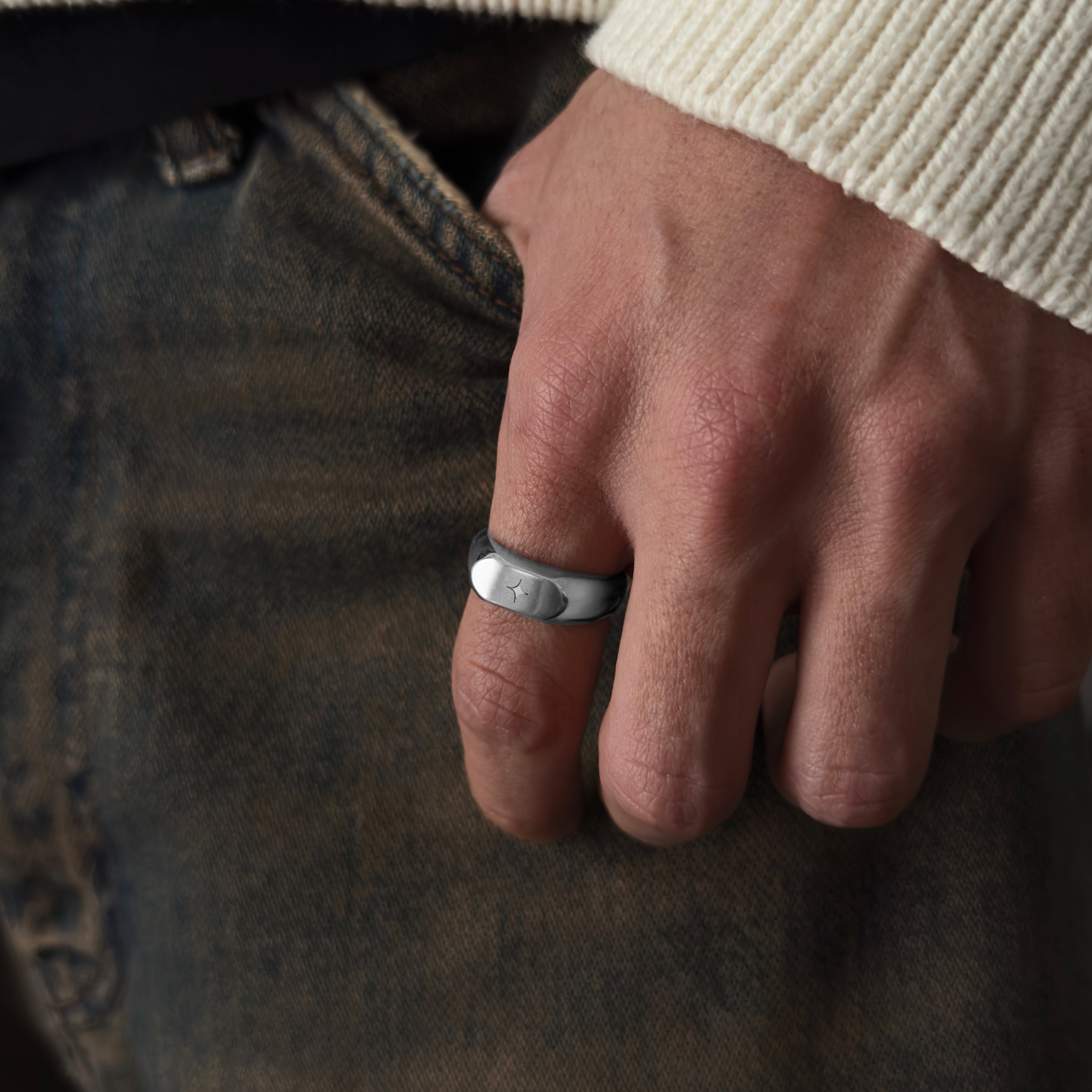 Signet Star Ring - Silver worn on a hand, showcasing JVillion® Streetwear Jewelry style.
