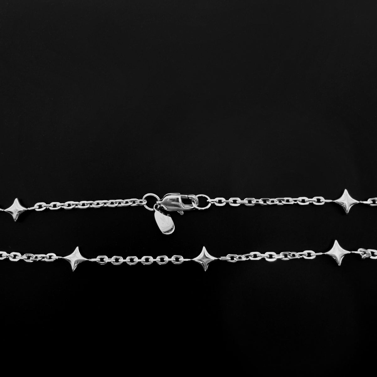 Elegant sterling silver star charm chain – modern celestial fine jewelry.